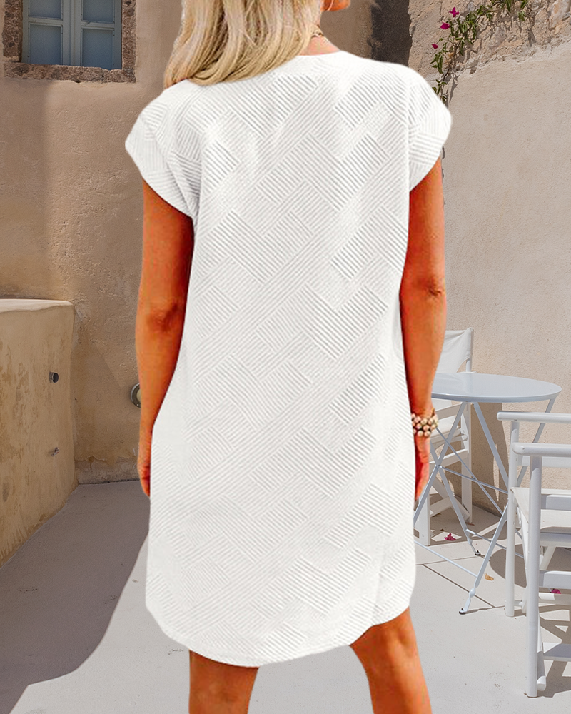 Robe à manches courtes et poche à col rond