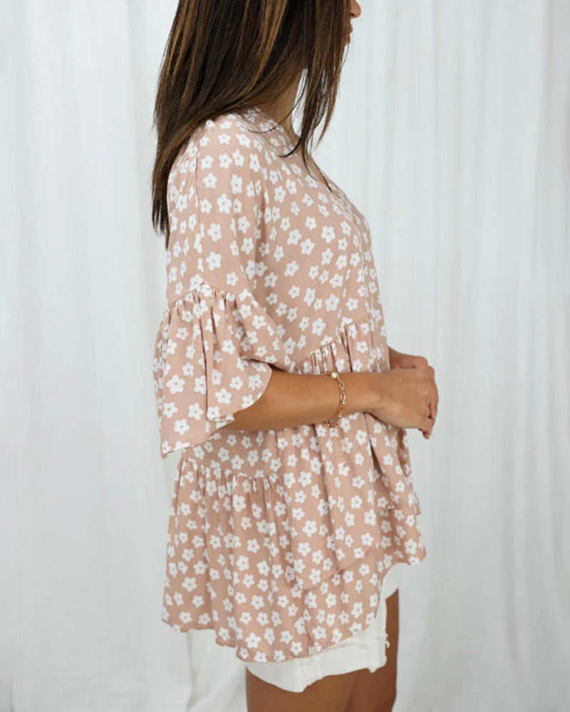 Blouse fleurie col V manches cloche