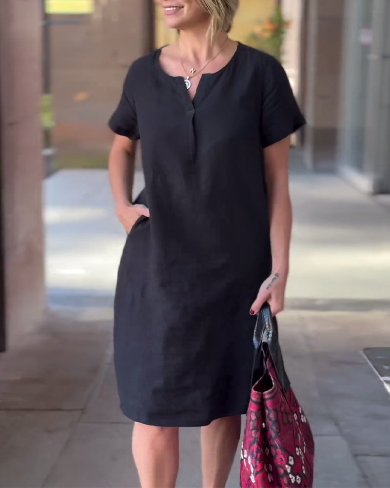 Robe de poche à manches courtes et col en V de couleur unie