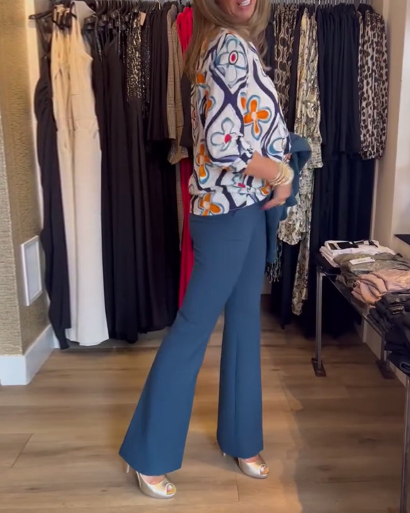 Blouse à col en V et à motif floral