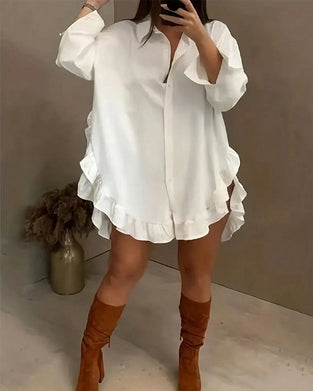 Chemise unie à volants et revers