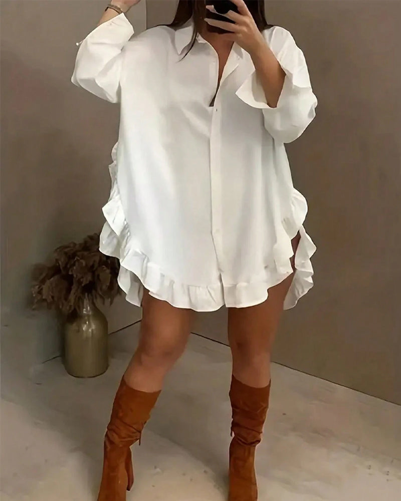 Chemise unie à volants et revers