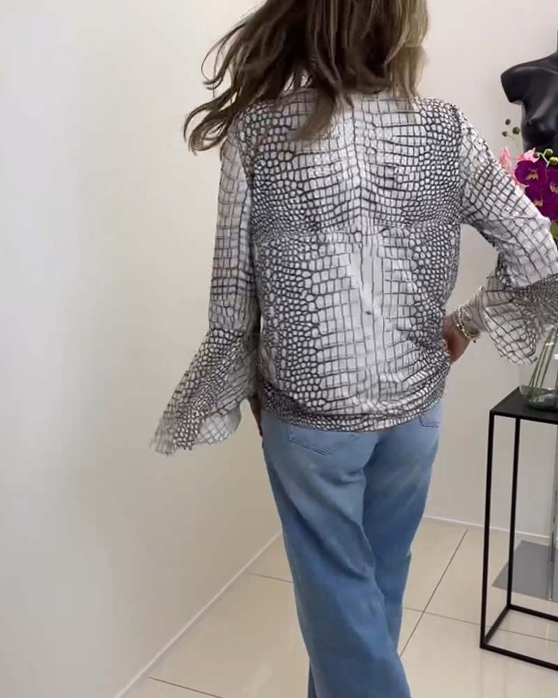 Blouse à motif floral et lanière