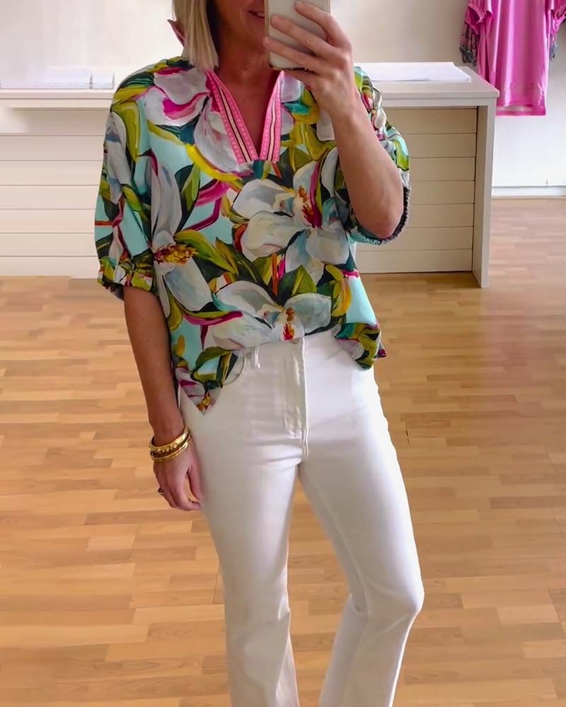 Blouse à manches mi-longues et col montant à imprimé floral