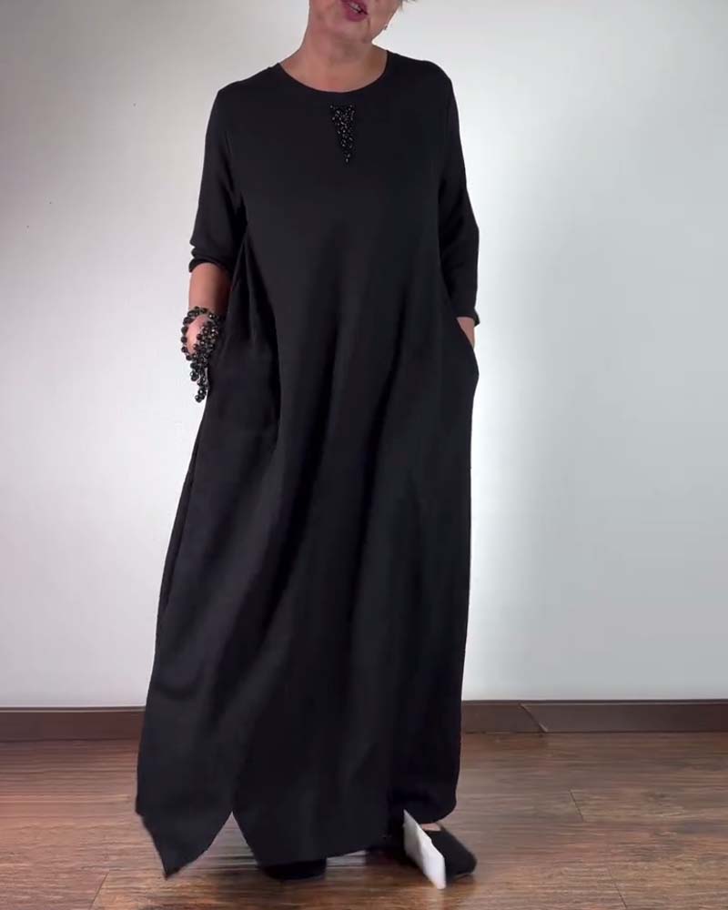 Robe ample à col rond de couleur unie