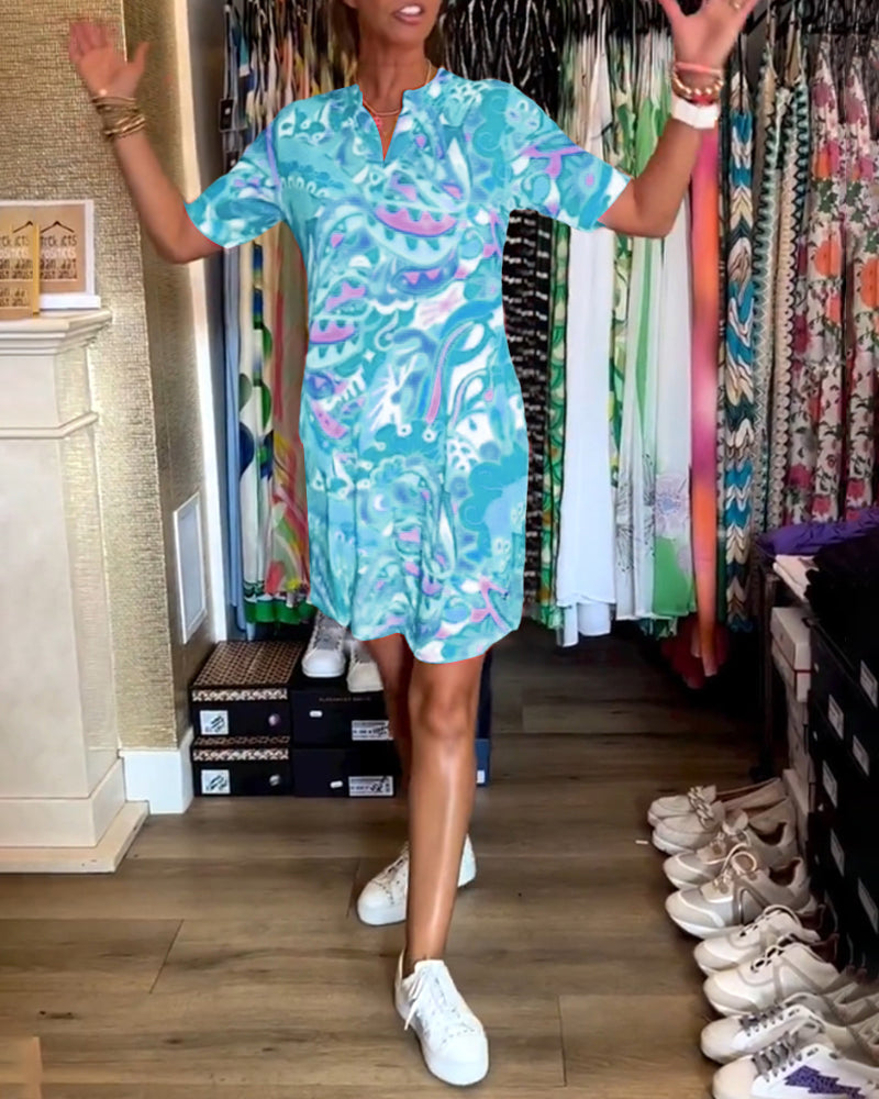 Robe avec poches et imprimés et manches courtes