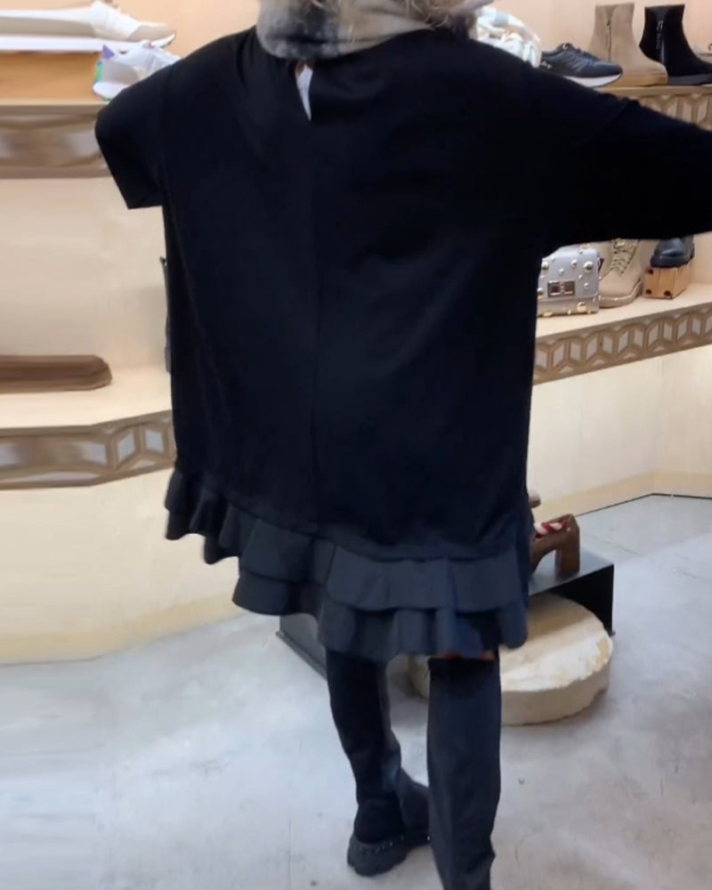 Robe à la silhouette élégante et aux manches longues