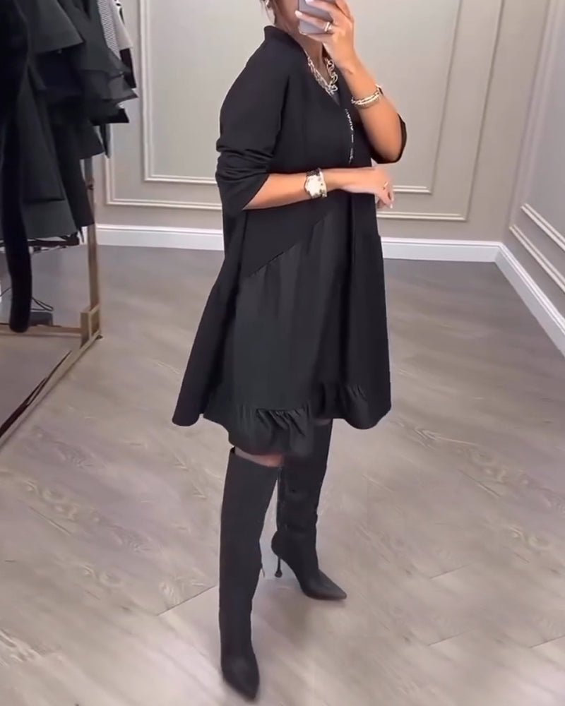 Robe à l'esprit artistique et col V