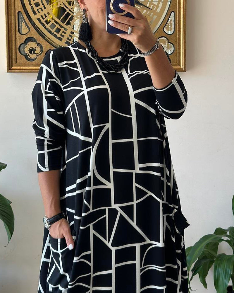 Robe ample avec poche et col rond