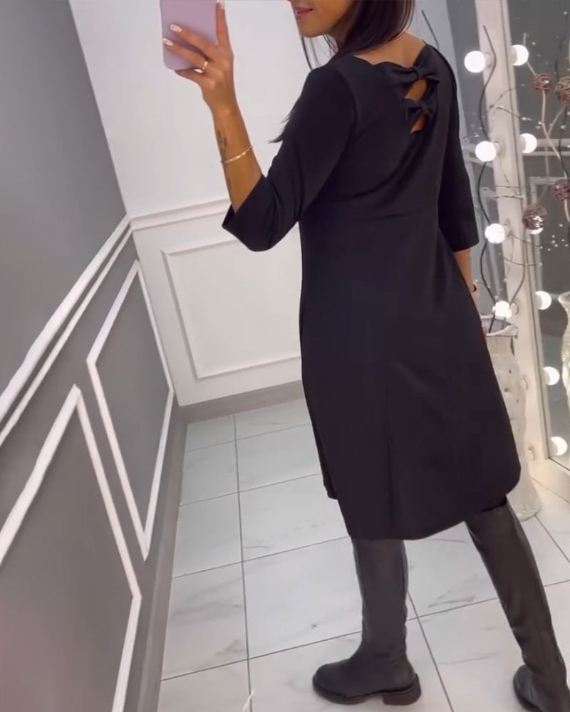 Robe unie avec nœud au dos