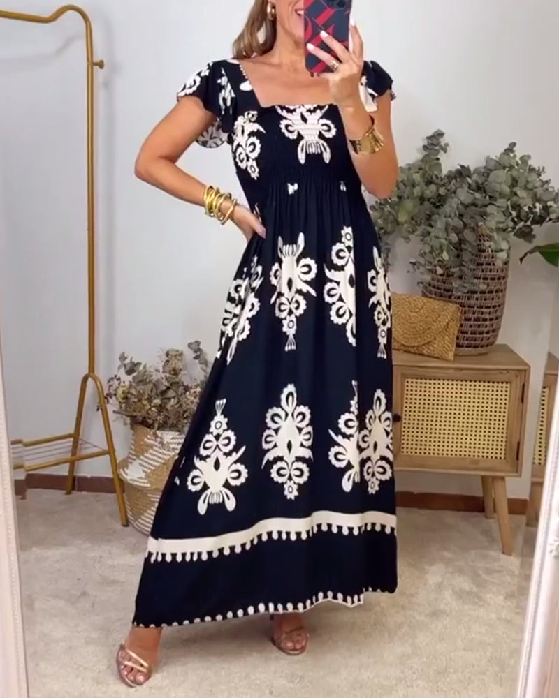 Robe élégante plissée imprimée à col carré