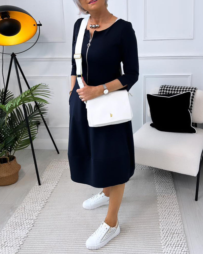 Robe décontractée de couleur unie avec poche zippée et col ras du cou