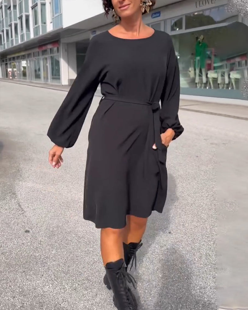 Robe unie col rond nouée