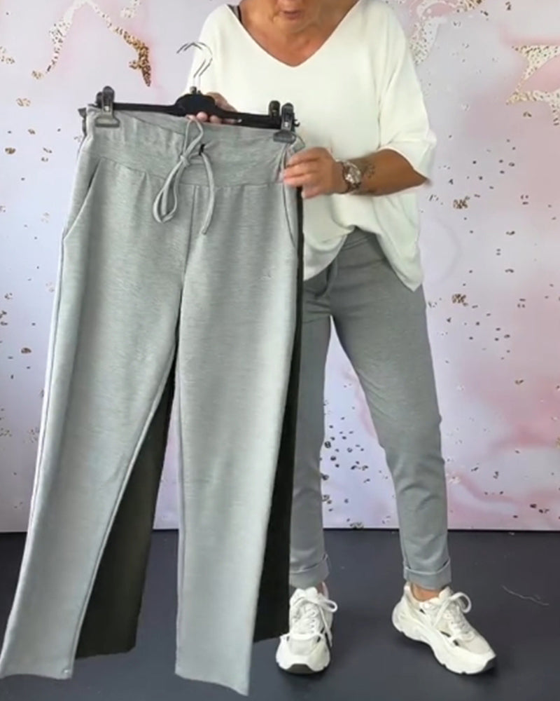 Pantalon décontracté de couleur unie avec cordon de serrage et poche