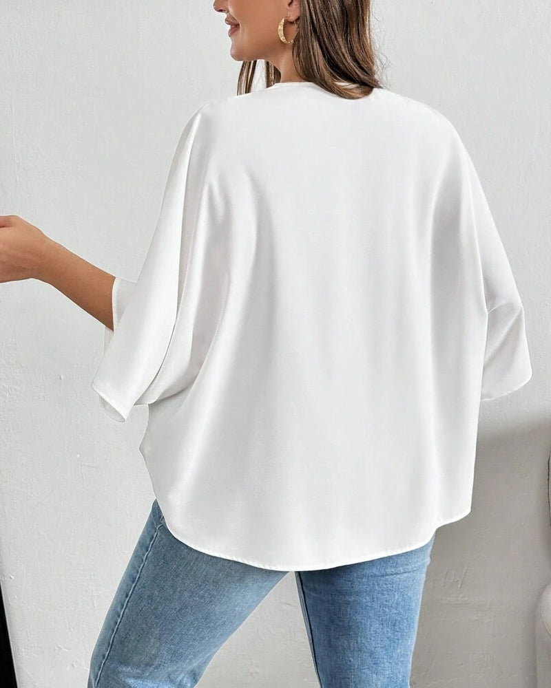 Blouse Col V Croix Irrégulière Unie