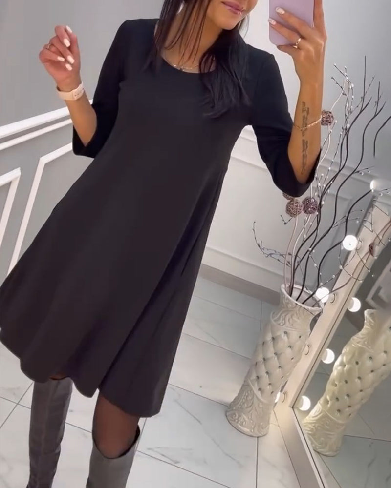 Robe unie avec nœud au dos