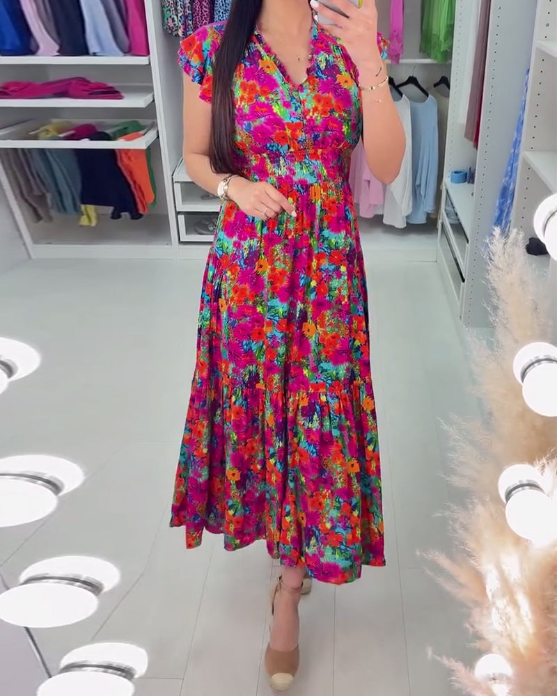 Robe élégante à imprimé floral coloré et col en V