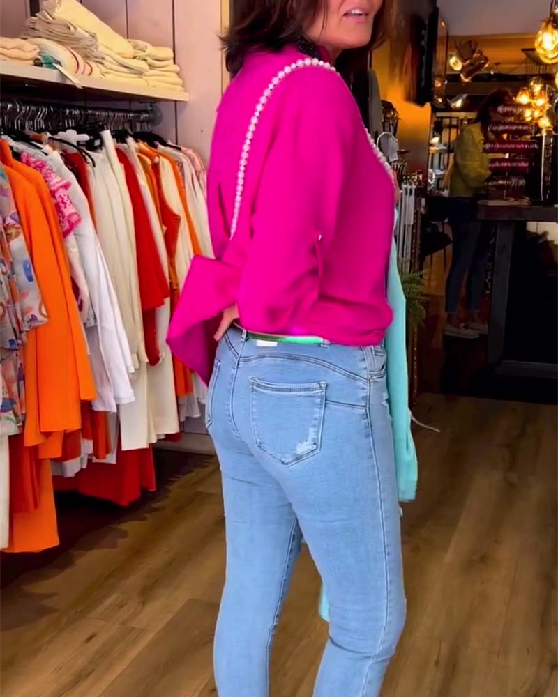 Blouse décontractée de couleur unie avec col en V et manches trois-quarts