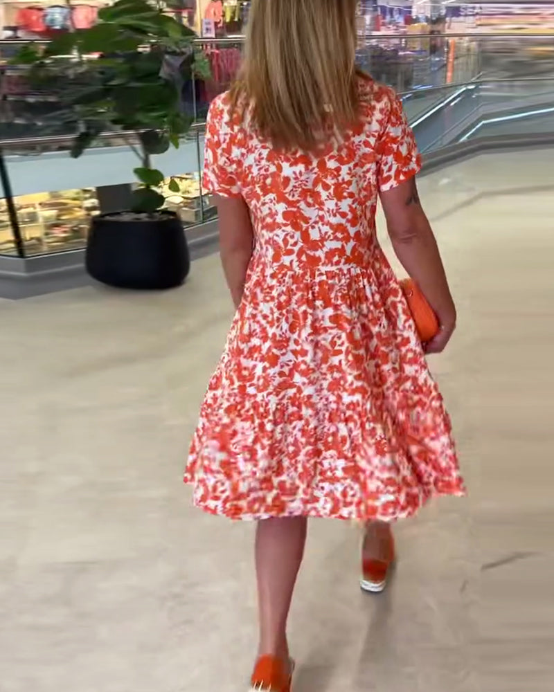 Robe midi à fleurs à manches courtes