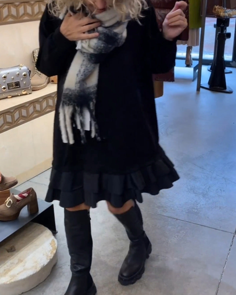 Robe à la silhouette élégante et aux manches longues