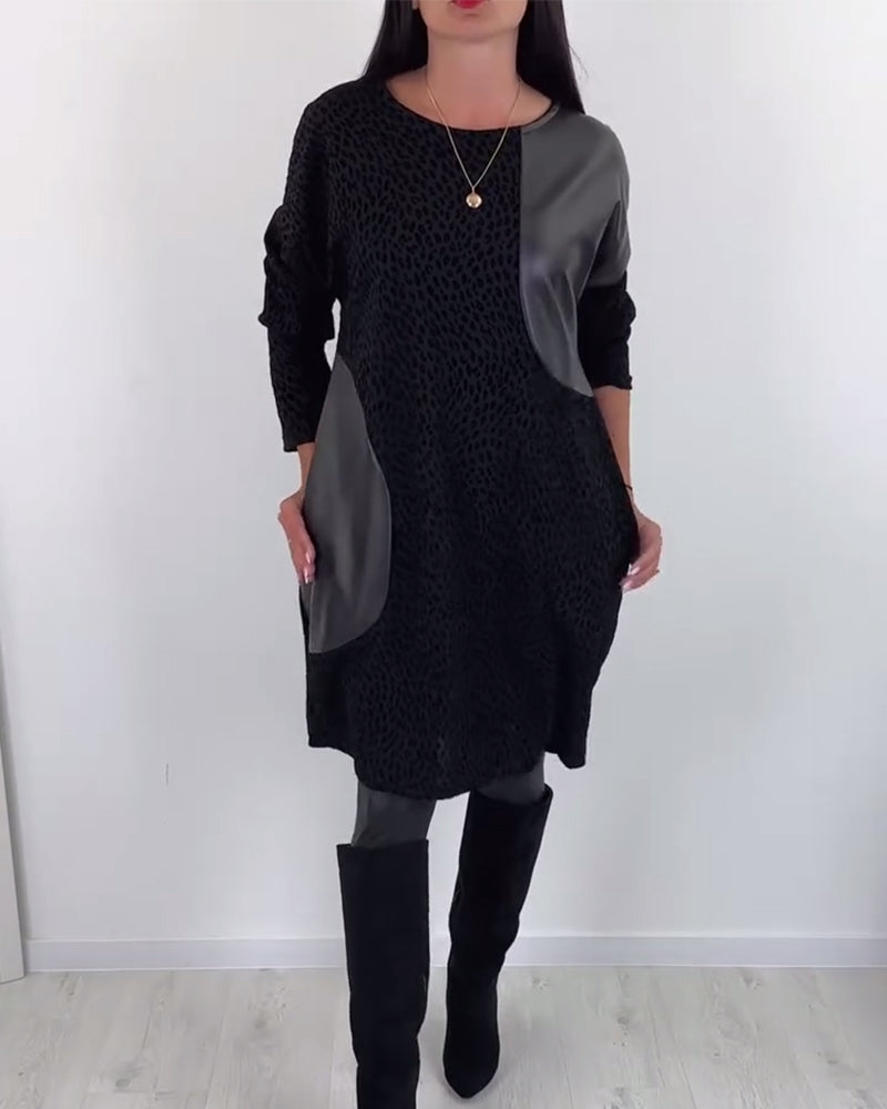 Robe élégante à empiècements et col rond