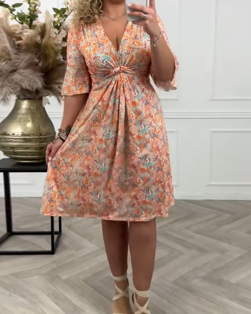 Robe à col V et twist et imprimé