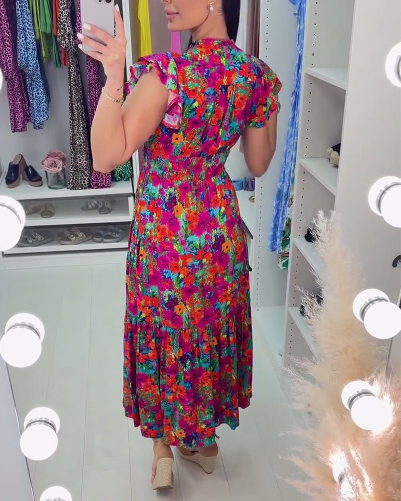 Robe élégante à imprimé floral coloré et col en V