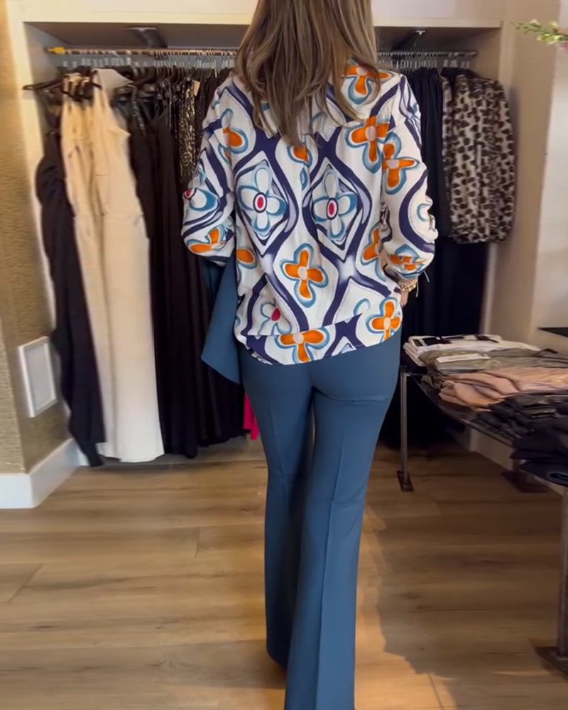 Blouse à col en V et à motif floral