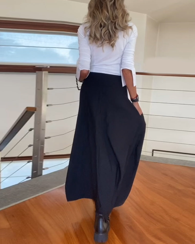 Jupe à poches zippées de couleur unie à la mode